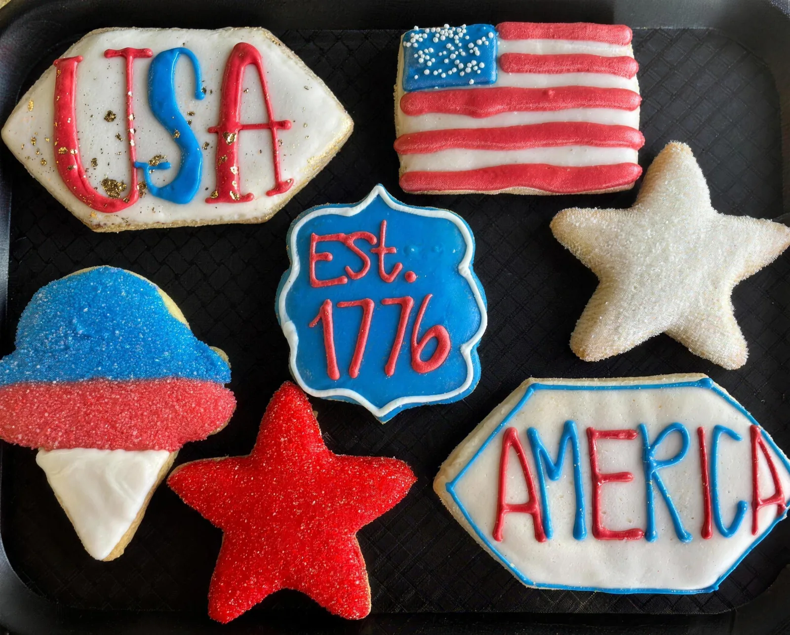 A tray of red, white and blue iced Fourth of July cookies