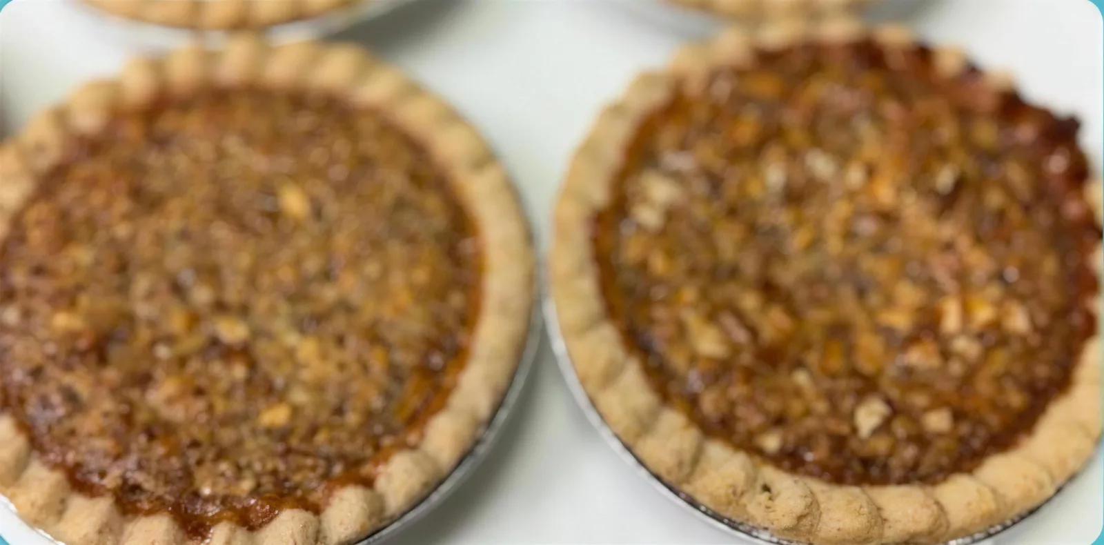 Mini pecan pies in foil tins