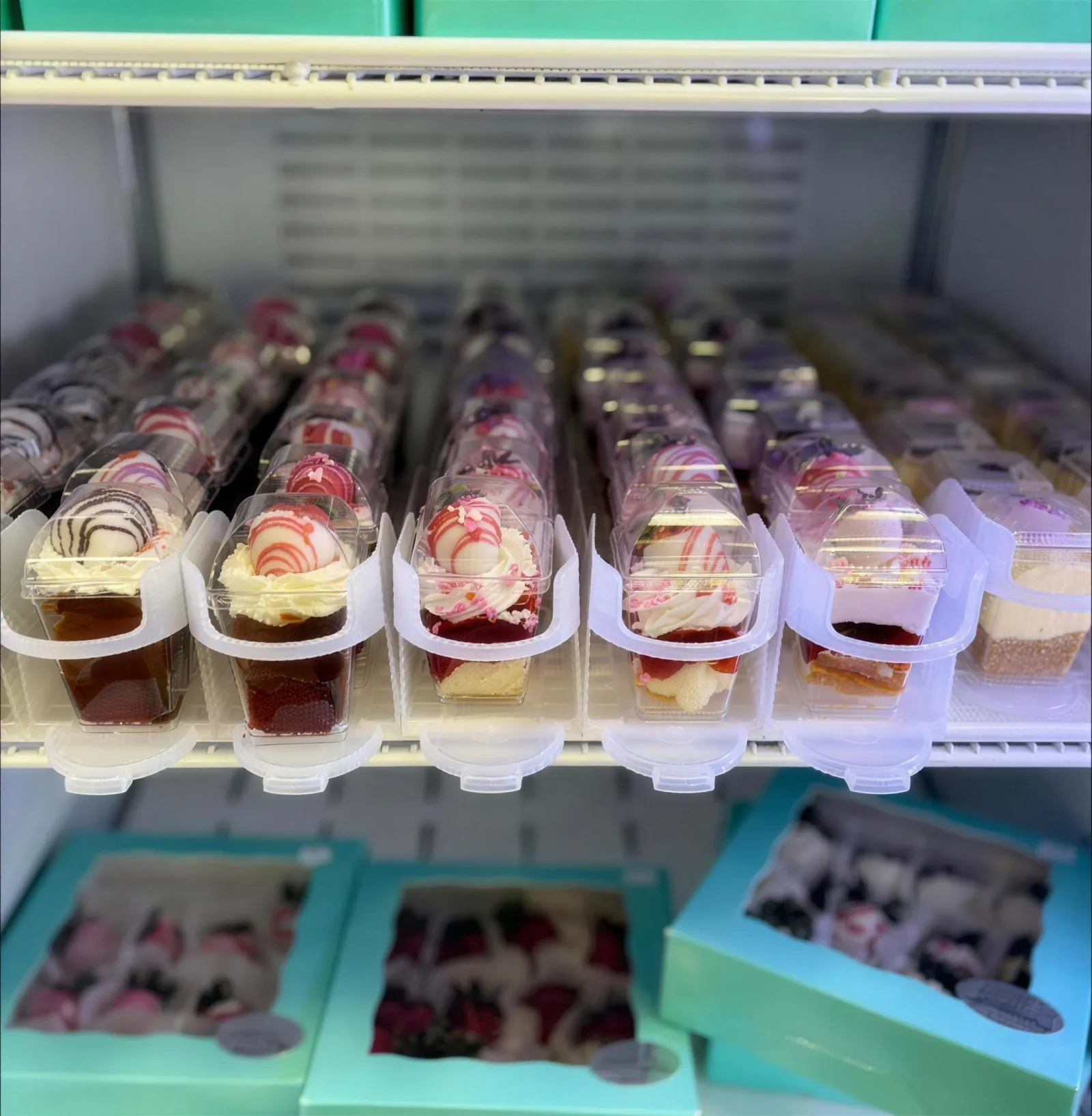 Dessert cups in Julie's bakery case